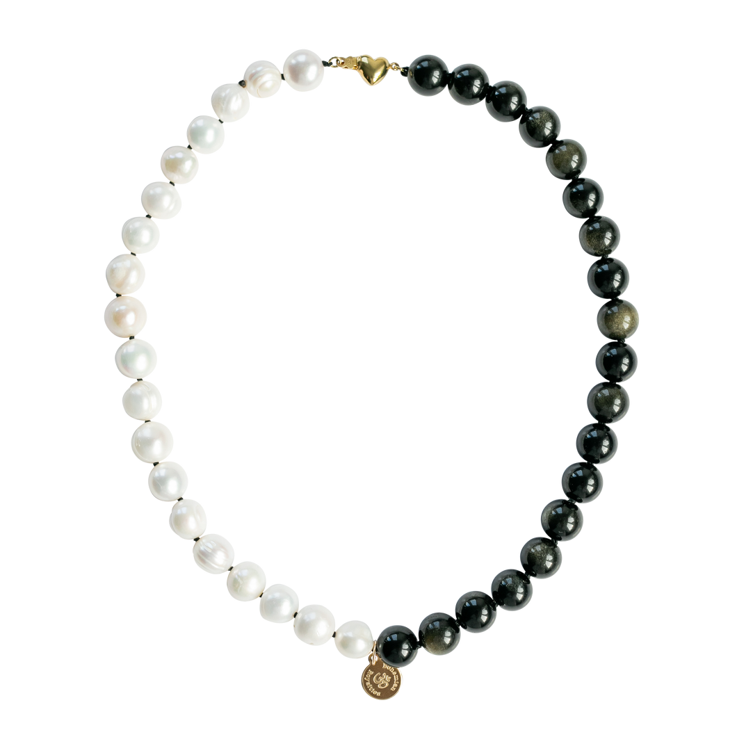 Pearl collier choker necklace. Handknotted pearl collier necklace with half in pearls and the other half in shimmering gold sheen obsidian gemstones. Details in 18k gold plated sterling silver.